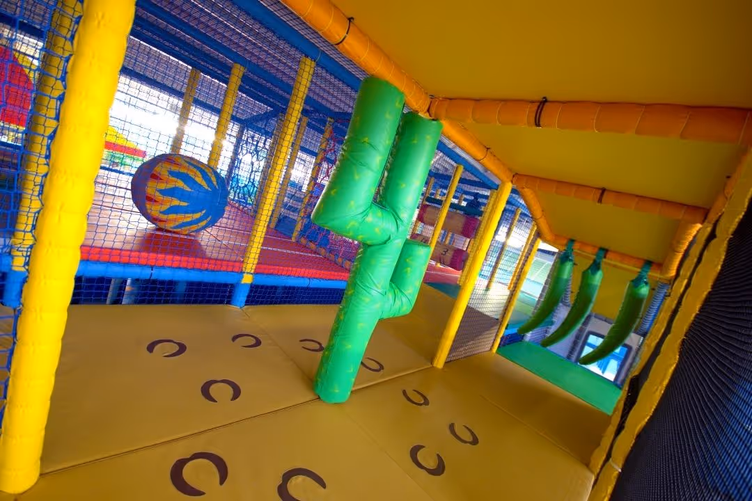 Indoor Play Barn area themed as Mexico with cactus in our soft play children' play area